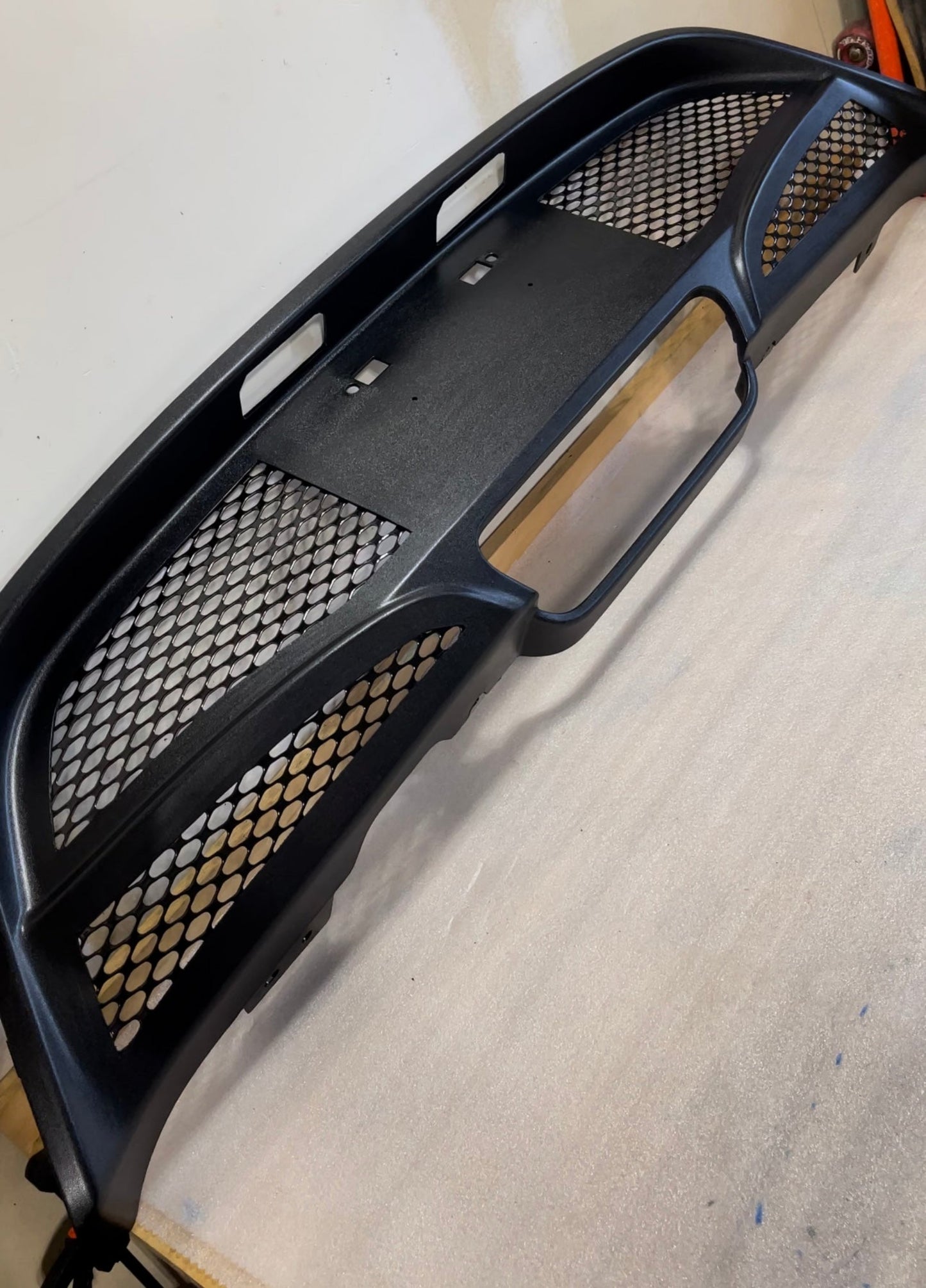 2012-2017 Veloster NAV, base and remix edition rear lower bumper cover w/ double mesh cutout